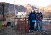 Cheryl Niquette and Jerry Schwartz stand in what remains of their dream home in Glide, Oregon. January 26, 2023 Beth Nakamura/Staff