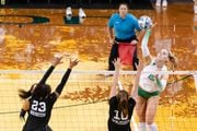 Mimi Colyer #15 of the Oregon Ducks hits the ball during the first set of the game against the Southeastern Louisiana Lady Lions in the first round of the NCAA volleyball tournament on Thursday, Nov. 30, 2023, at Matthew Knight Arena in Eugene.