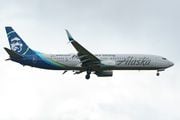 An Alaskan Airlines plane lands at PDX March 15, 2023. 