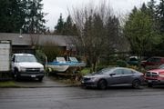 Scenes from a neighborhood, seen here on Mon., Dec. 4, 2023, where Clark County sheriff's officials said five family members died in a house in an apparent murder-suicide the day before.