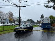 Authorities said a child was killed and another person injured in a dog mauling inside a residence in Northeast Portland. This was the scene outside on Tuesday morning, Dec. 5, 2023.