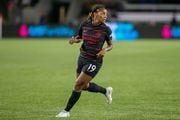 Portland Thorns midfielder Crystal Dunn during an NWSL match against Racing Louisville FC at Providence Park in Portland, Oregon on Wednesday, Sept. 21, 2022.