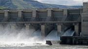 Water moves through a spillway of the Lower Granite Dam on the Snake River near Almota, Wash. A leaked document says the U.S. is willing to build enough new clean energy projects in case Snake River dams are breached to help restore salmon runs.