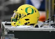 An Oregon Ducks helmet sits on an equipment box during a college football game between the Southern Utah Thunderbirds and Oregon Ducks on September 2, 2017, at Autzen Stadium in Eugene, OR.  (Photo by Brian Murphy/Icon Sportswire via Getty Images)