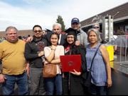The Rouse family pose for a picture celebrating Kristina Rouse's graduation from Washington State University in 2017. To Kristina Rouse's left is her younger sister, Melissa Rouse, and behind them is their father, Stuart Rouse, who on Dec. 3, 2023, shot and killed his daughters, his wife (far right), his brother (far left) and himself.